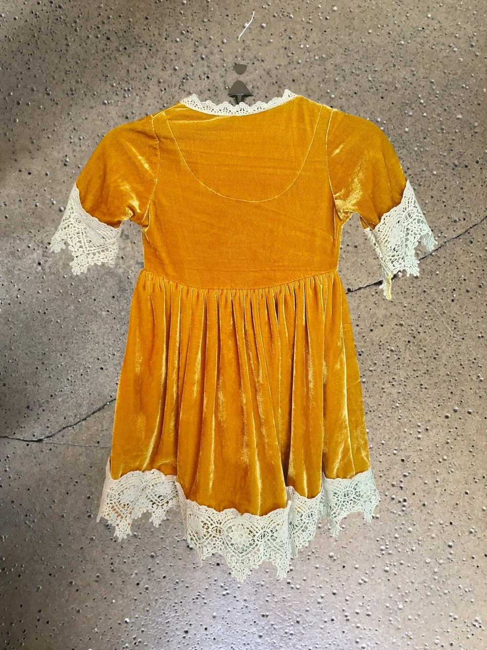 Trish Scully top button